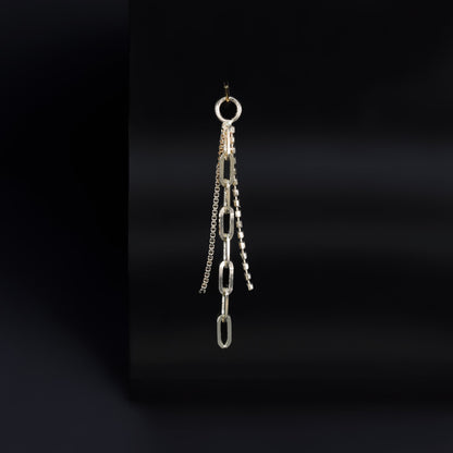 14K yellow gold mixed chain charm that comes with clip chain, box chain and ball chain displayed on black surface