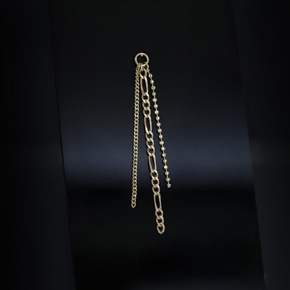 14K gold triple mixed chain charm on a black background