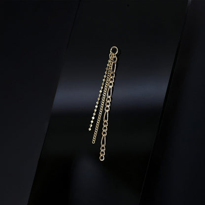 14K gold triple mixed chain charm on a black background